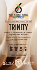 Coffee packaging for 'The Sixth Soul' Trinity coffee blend with branding and certification details.