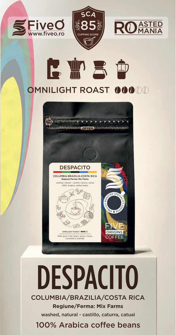 A coffee bag product display on a pedestal with branding for FiveO and SCAs 85, featuring the Despacito Colombia/Brazilia/Costa Rica coffee beans.