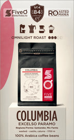 A package of Five O Coffee's Columbia Excelso Paramo coffee beans, displayed on a white pedestal. The product is shown in a black stand-up pouch with a white and red label.